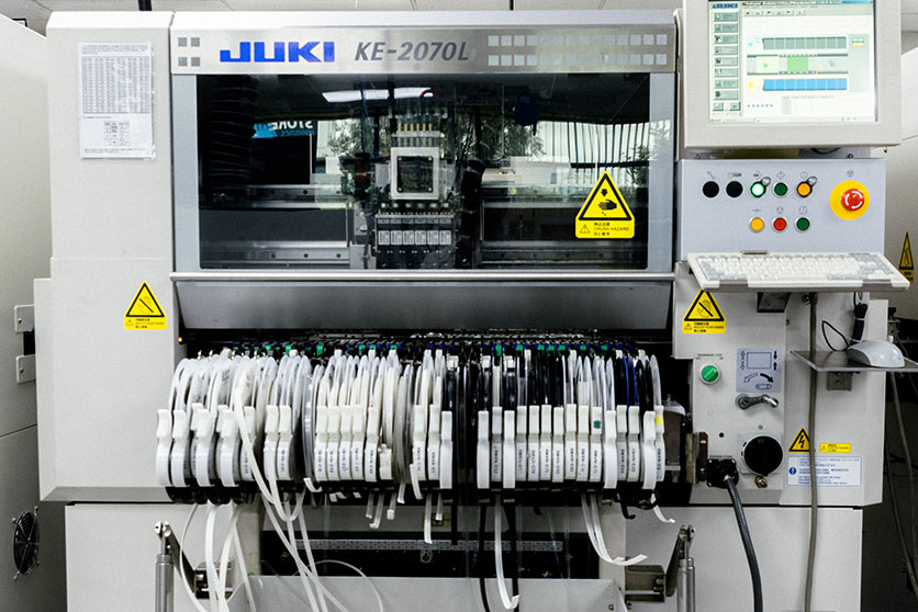 Juki machine printing a circuit board